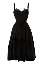 Load image into Gallery viewer, Elegant black velvet midi dress featuring a structured bodice and corset back with lace detailing on the bust, and a pleated full volume skirt for an hourglass silhouette. Ideal for special occasions like Valentine’s Day, birthdays, date nights, black-tie events, or upscale evening wear.
