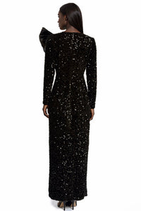 Full length fitted sequin gown with an oversized satin bow detail 